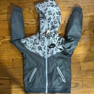 Nike light jacket size 4. Used like new